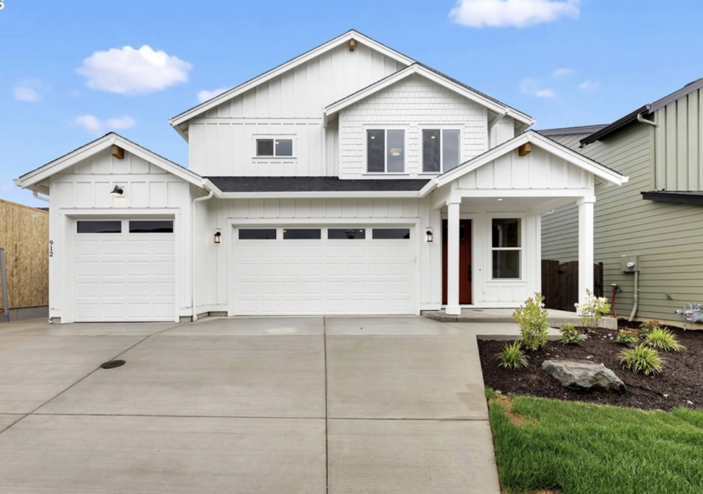 White home in a subdivision in Battle Ground, WA